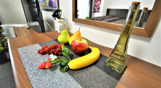 Кровать в общем номере с 6 комнатами KIYAZA Station Sapporo