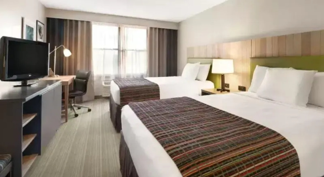 Четырёхместный номер Standard Country Inn & Suites by Radisson, Minneapolis-Shakopee