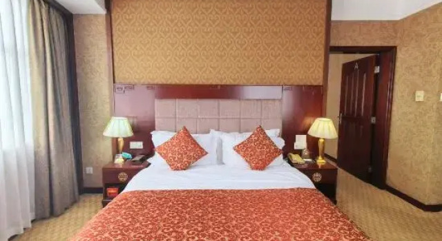 Четырёхместный люкс Executive Taishan Gaoye Hotel