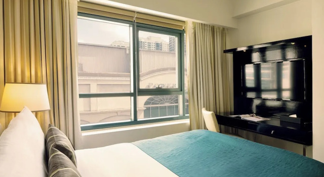 Люкс с 2 комнатами с балконом Aruga Apartments by Rockwell Makati
