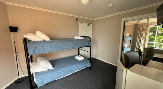 Кровать в общем номере Ulladulla Harbour Motel