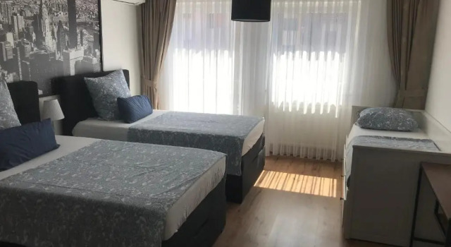 Четырёхместный номер Standard с балконом Maxim Apartments Mainz