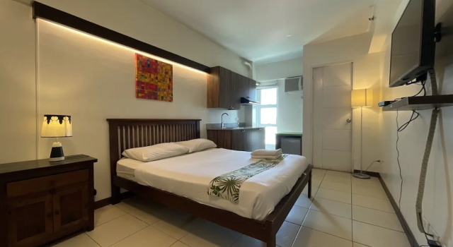 Номер Deluxe H Hotel Quezon City