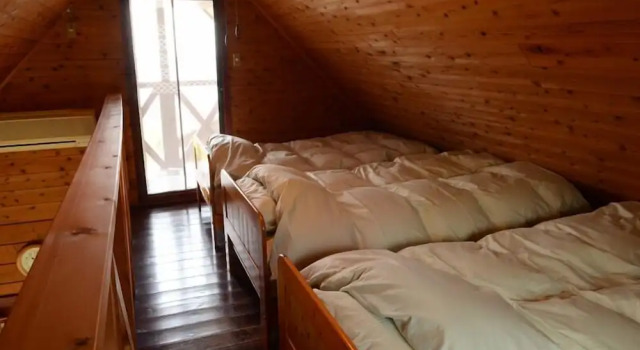 Коттедж с балконом TIDA Resort Yakushima 旧 屋久島海の胡汀路てぃーだ