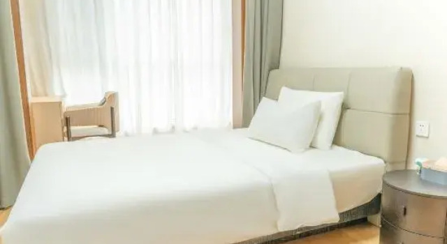 Семейный люкс Deluxe с 4 комнатами Yantai Puyuan  Hotel