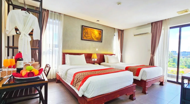 Трёхместный семейный номер Standard с балконом Le Botum Hotel