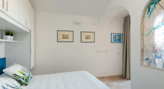 it has 1 bedroom communicating with living room with sofa bed, kitchen, large terrace (with table an-SHERDEN BILO 8, Prenota Hotel Golfo Aranci Costa Smeralda