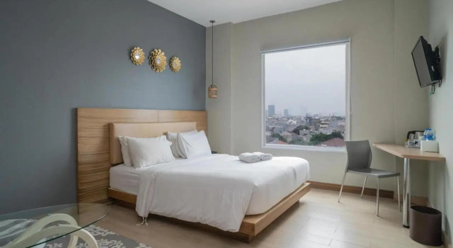 Трёхместный люкс U Stay Hotel Mangga Besar