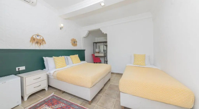 Трёхместный номер Standard с видом на сад KİRAZ BEACH OTEL