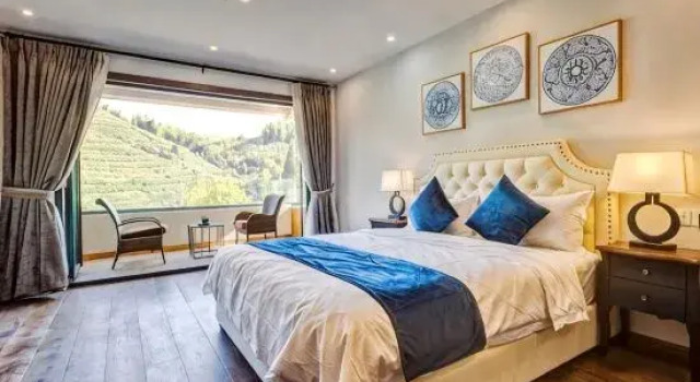 Кровать в общем номере Jingting Hotel