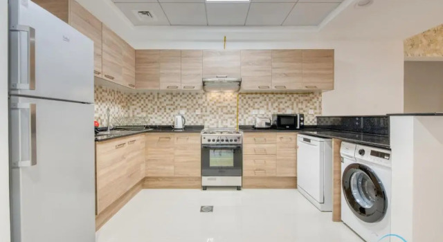 Sunny 1BR at Canal Residences West Dubai Sports City by Deluxe Holiday Homes