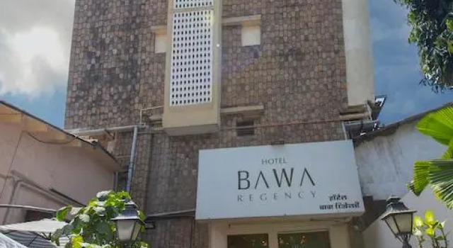 Кровать в общем номере Hotel Bawa Regency Dadar
