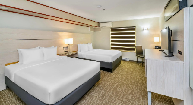 Quality Inn Sunshine Suites, Забронировать Отель Отели Британской Колумбии с парковкой, Парковка