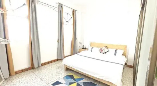 Кровать в общем номере Xingka Homestay