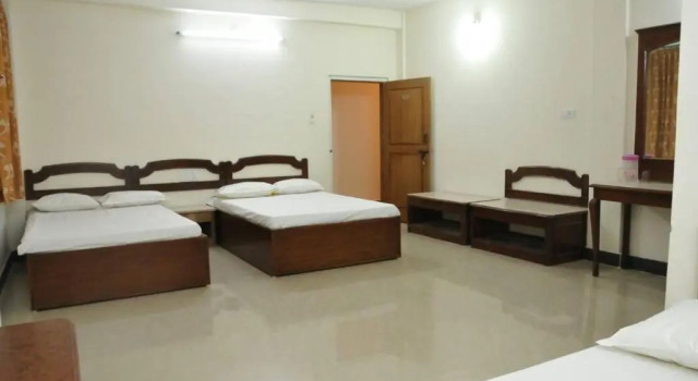 Кровать в общем номере MYSORE MAHALAKSHMI ROOMS