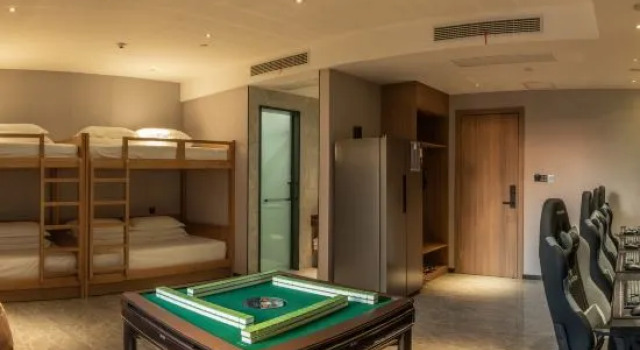 Кровать в общем номере QueliE-sports Hotel（ShangqiuNormal University Branch)