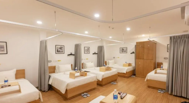 Кровать в общем номере Đại Nam SG Hotel