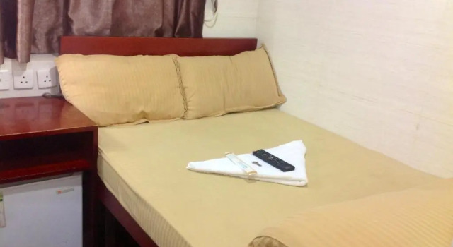 New Yan Yan Guest House reception 9th floor Flat E4 E6, Book Pension Billige hoteller i Hong Kong Island