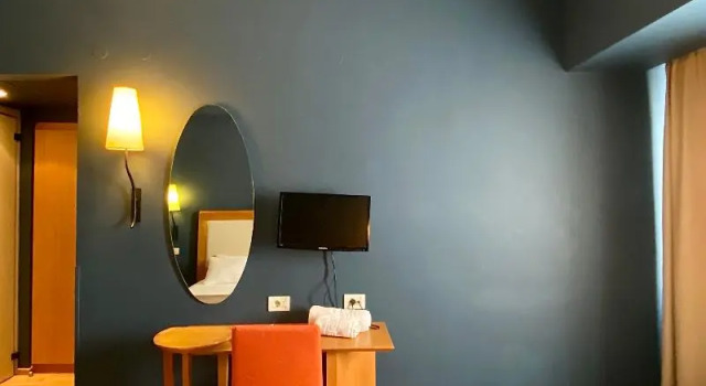 Трёхместный номер Standard с балконом Olympic Hotel