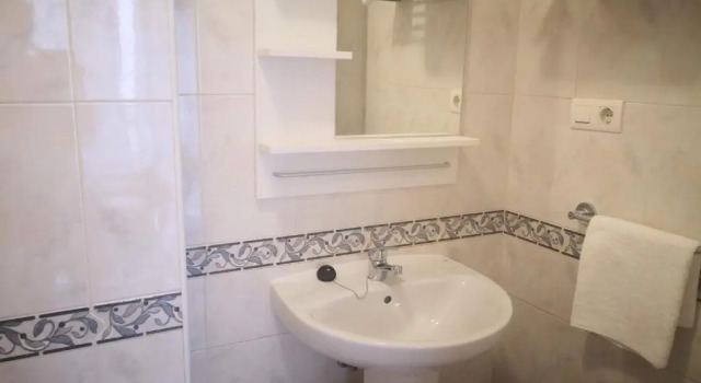 Апартаменты Apartamentos El Barrio