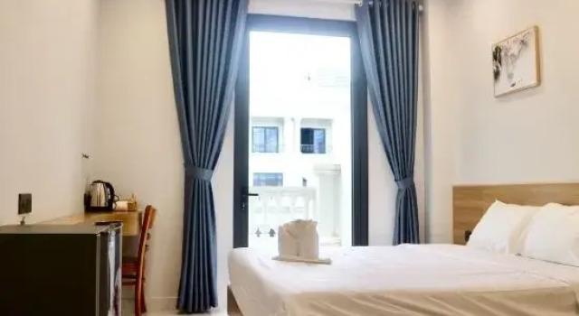 Номер Deluxe Blue Waves Grand World Phu Quoc Hotel