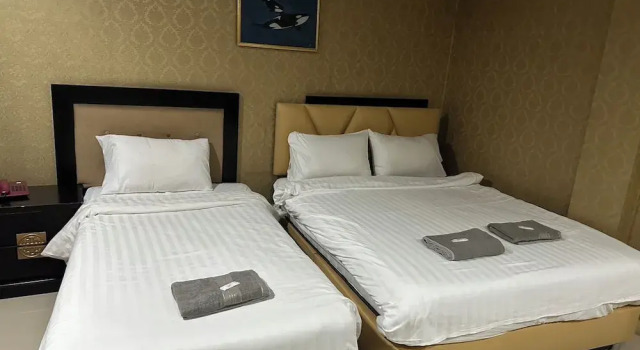 Трёхместный номер Standard Orchid Inn SKV3