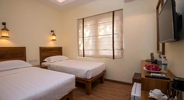Кровать в общем номере Bagan Vertex Hotel