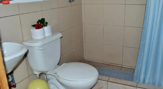 Кровать в общем номере Colonial House Inn