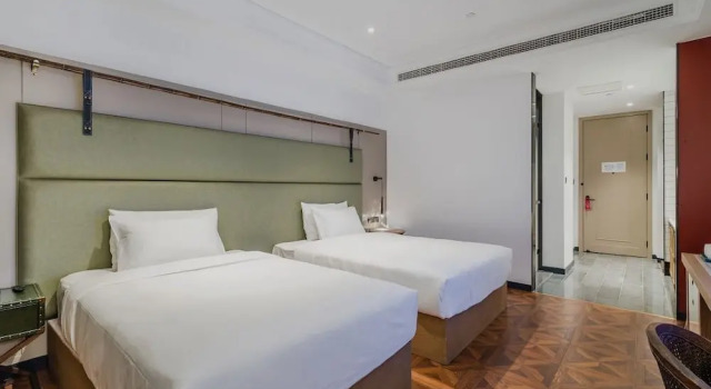 Семейный номер Standard Manxin Hotel Qingdao Zhanqiao