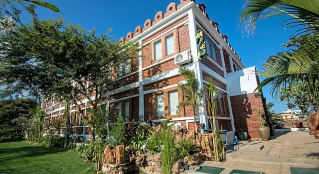 Кровать в общем номере Bagan Vertex Hotel