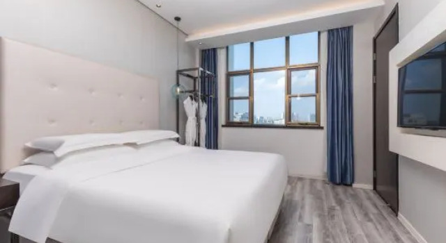 Люкс Business China Youth Hostel Landscape Garden Hotel (Suzhou Wujiang RT-Mart)