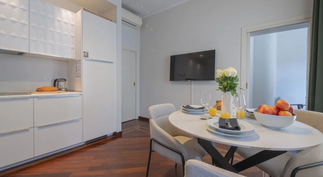 Corso Venezia - Elegant 1 BR apt With Shared Rooftop Terrace in the Heart of Milan, Забронировать Апартаменты/квартира Апартаменты Милана, рядом с Универмаг Excelsior, Апартаменты/квартира