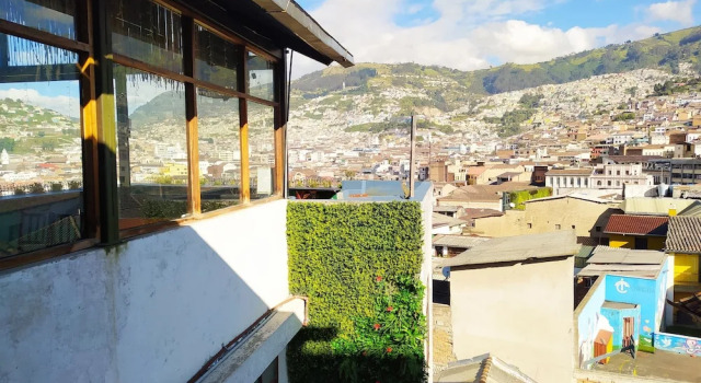 Кровать в общем номере Hostal La Guayunga RoofTop