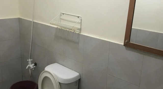 Bett im Wohnheim Wendys Apartelle