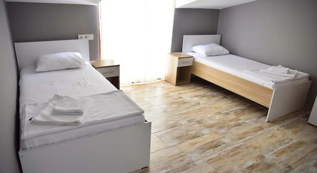 Семейные апартаменты с 2 комнатами с балконом Vavilla Apartment