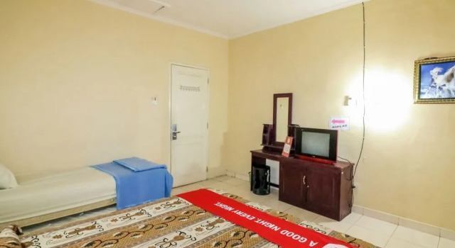 Nida Rooms 9 Kraton Tugu Railway Station at Hotel Queen Star