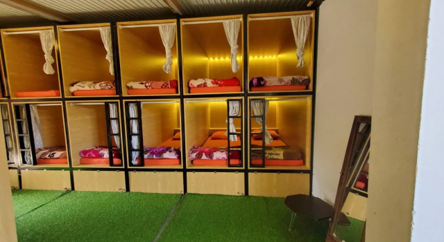 Кровать в общем номере Tropical Garden Homestay