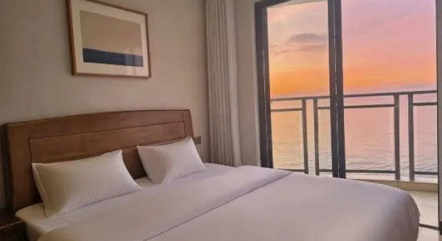 Люкс с 4 комнатами с красивым видом из окна Woniu Lvdou Scenic Apartment (Beibuwan No. 1)