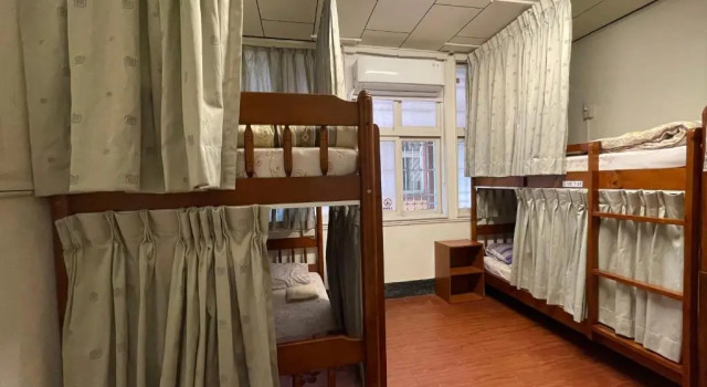 Кровать в общем номере Tainan Guest House Hamuya