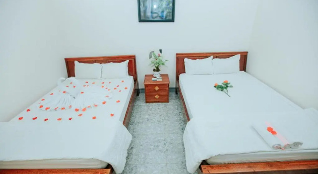 Четырёхместный номер Standard Nhà Nghỉ Kim Lài - Đối diện bệnh viện tỉnh Gia Lai -132 Tôn Thất Tùng