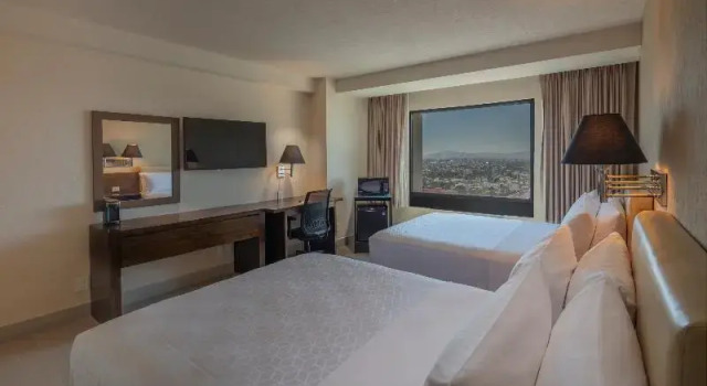 Четырёхместный номер Standard с красивым видом из окна Holiday Inn Puebla La Noria by IHG