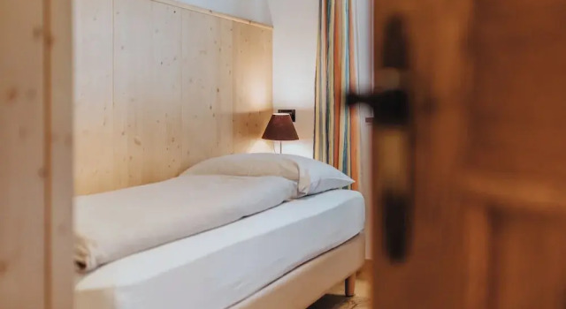Кровать в общем номере с 3 комнатами с балконом Residence Obermoarhof - Family Apartments with Pool & Playground