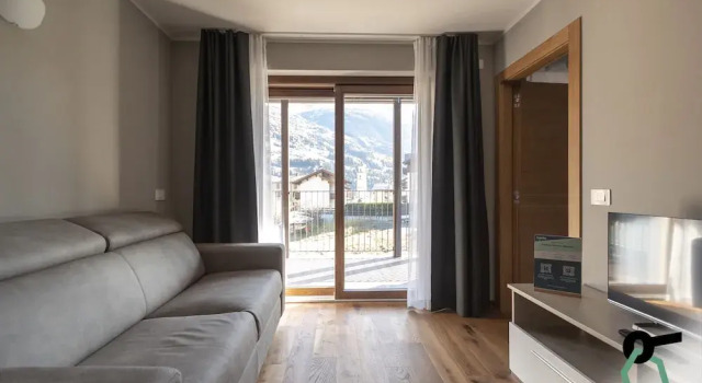 Четырёхместные апартаменты c 1 комнатой с балконом HOTIDAY Bormio Apartments
