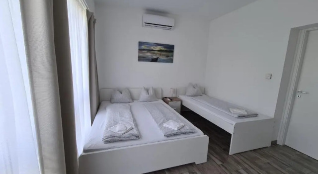 Апартаменты Цокольный этаж Surman Apartmanok