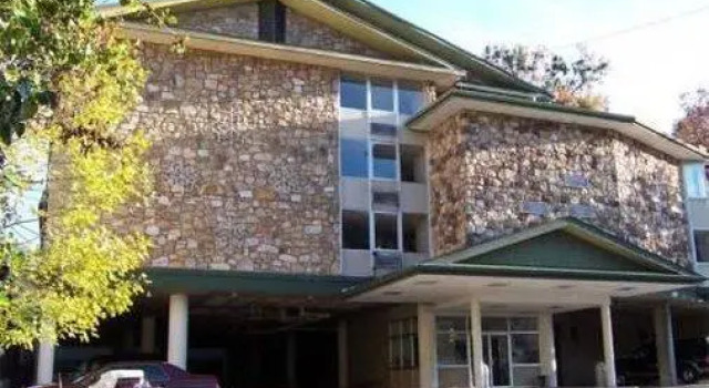 Кровать в общем номере Reagan Resorts Inn