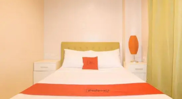 Люкс RedDoorz @ Benelio Suites Pavia Iloilo
