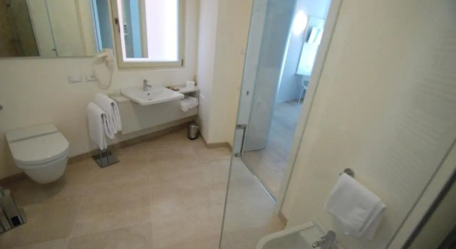 Номер Comfort Aromi Piccolo Hotel