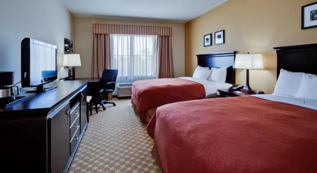 Четырёхместный номер Standard Country Inn & Suites by Radisson, Port Orange-Daytona, FL
