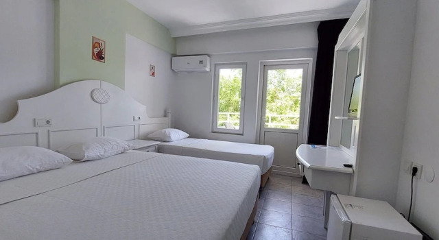 Standardowy trzyosobowy pokój UK Hotels Kiriş