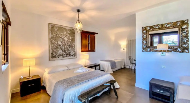 Четырёхместный номер Standard с видом на сад Tenuta Novecento Bioagriturismo